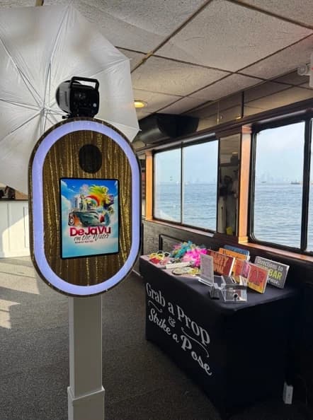 Nova booth beside large windows overlooking the water